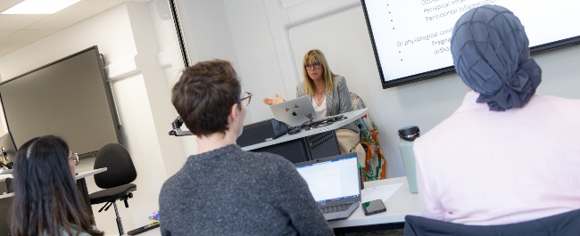 Students listening to external speaker on a study day